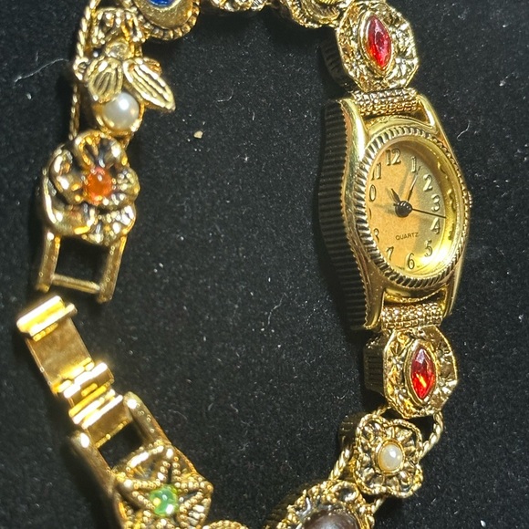 Avon vintage GRUNGE QUARTZ WATCH SLIDE CHARM BRACELET GOLD TONE- collectables - Picture 4 of 17